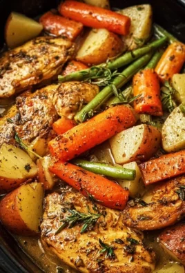 Delicious slow cooker garlic butter chicken with veggies ready to eat