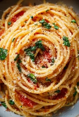 Delicious Tomato Butter Pasta served in a bowl with herbs