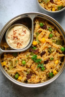 Colorful array of healthy Indian lunch box recipes for kids.