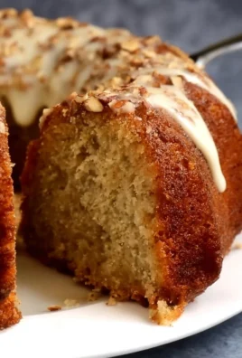 Delicious homemade Banana Bundt Cake served on a decorative plate.
