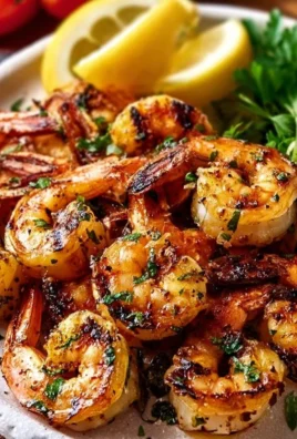 Delicious marinated grilled shrimp on a barbecue grill