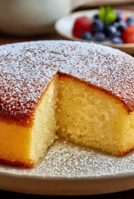 Fluffy slice of homemade sponge cake on a plate
