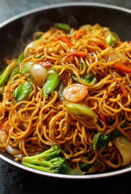 Quick and easy 15-minute Lo Mein recipe with colorful vegetables and noodles.