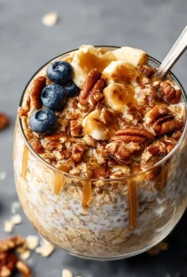 Bowl of Maple Brown Sugar Overnight Oats topped with fresh fruit