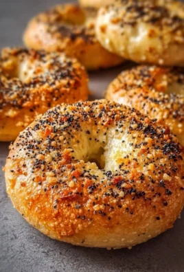 High protein cottage cheese bagels served on a plate with toppings
